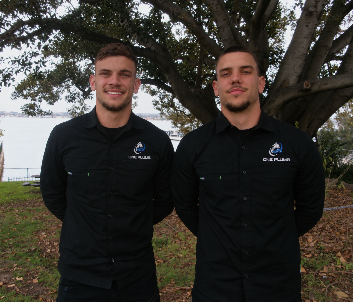 Luka and Tomi, the two brothers behind One Plumb, in their black One Plumb work shirts